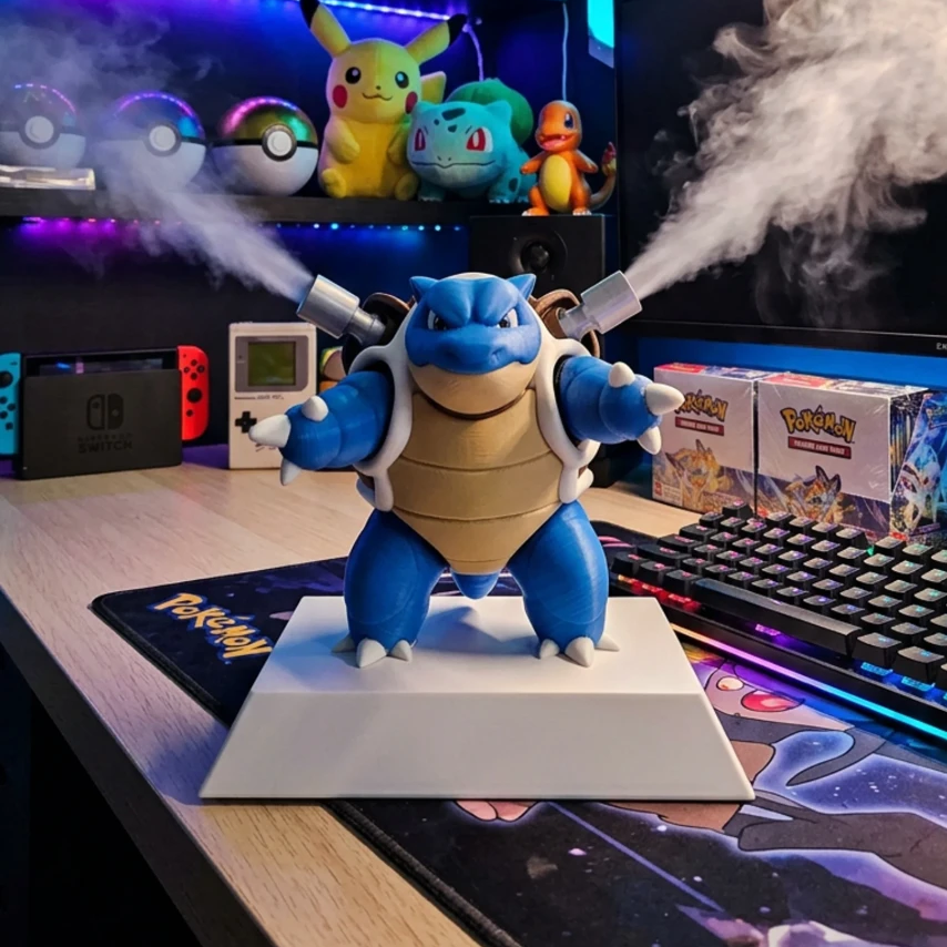 Double Cannon Mist misting on a gaming desk next to a keyboard